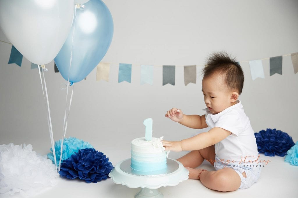 one year old baby boy cake smash portraits in singapore studio