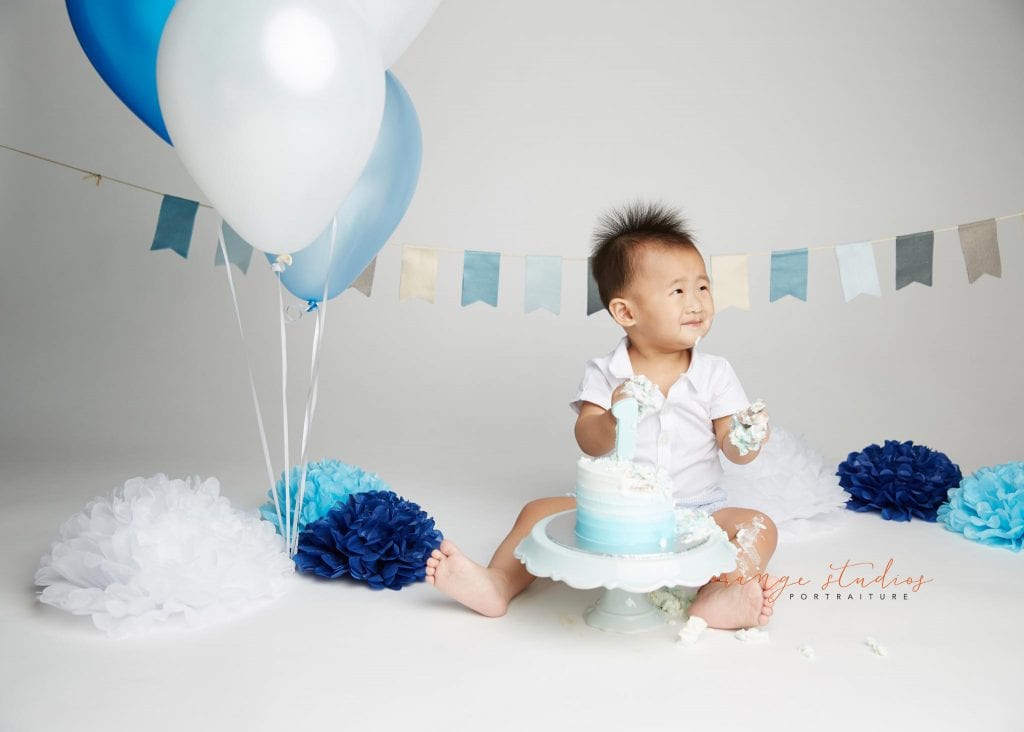 one year old baby boy cake smash portraits in singapore studio