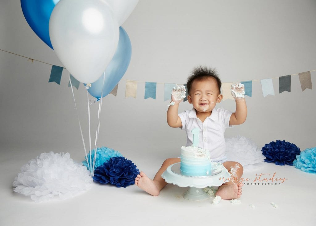 one year old baby boy cake smash portraits in singapore studio