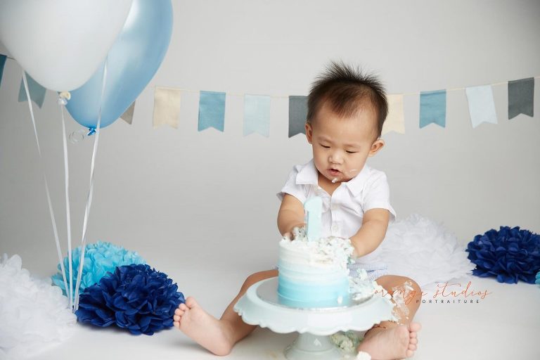 one year old baby boy cake smash portraits in singapore studio