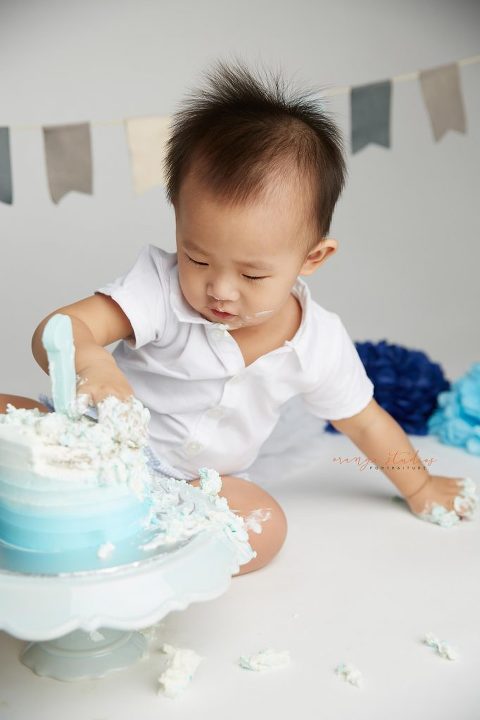 one year old baby boy cake smash portraits in singapore studio