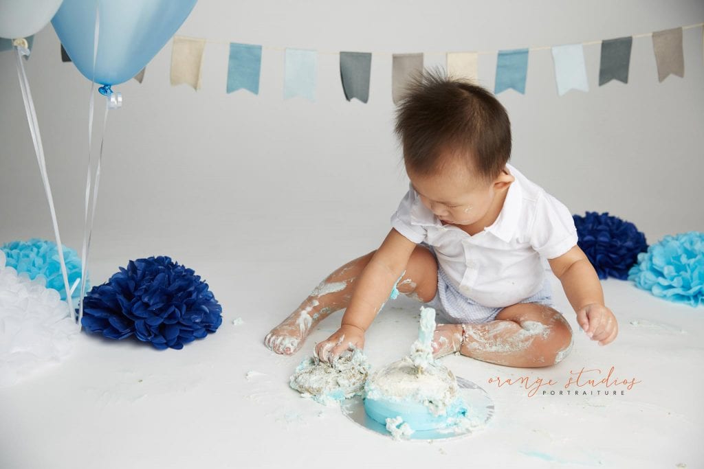 one year old baby boy cake smash portraits in singapore studio