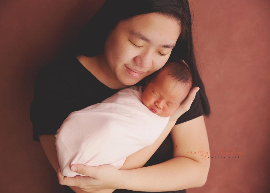 7 days old baby girl newborn portraits with mum in singapore studio