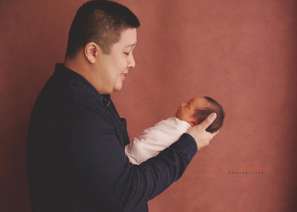 7 days old baby girl newborn portraits with dad in singapore studio