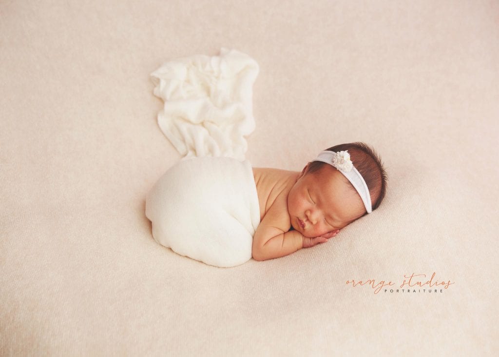 7 days old baby girl newborn portraits in singapore studio