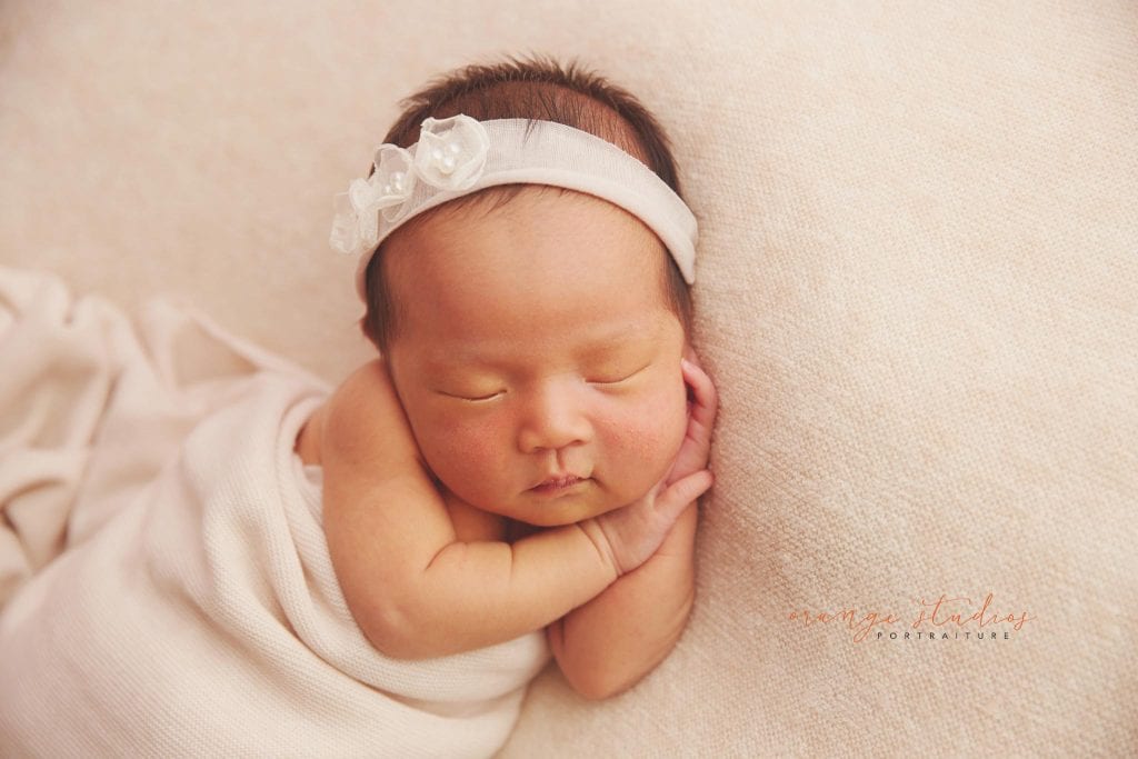 7 days old baby girl newborn portraits in singapore studio