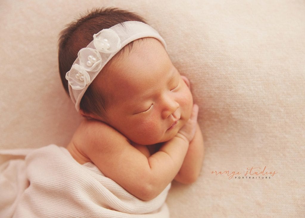 7 days old baby girl newborn portraits in singapore studio