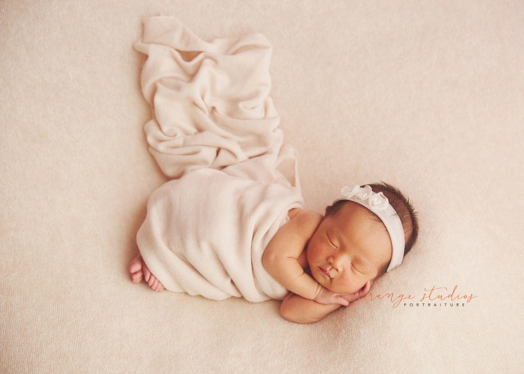 7 days old baby girl newborn portraits in singapore studio
