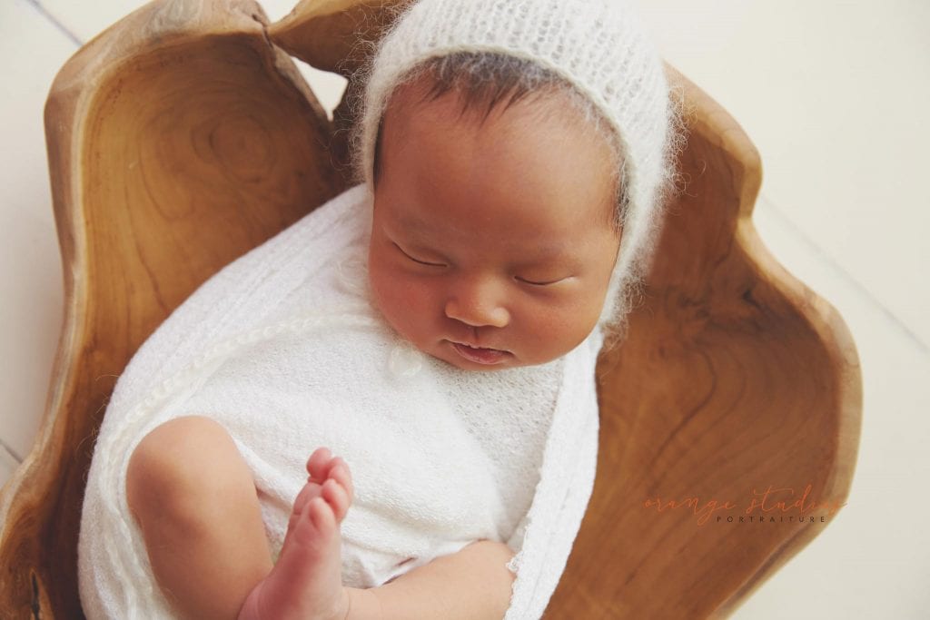 7 days old baby girl newborn portraits in prop in singapore studio