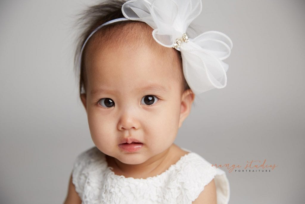 one year old baby girl portraits in singapore studio