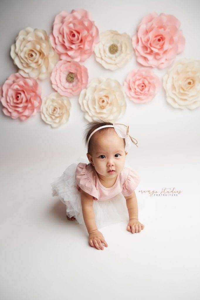 one year old baby girl flower wall portraits in singapore studio