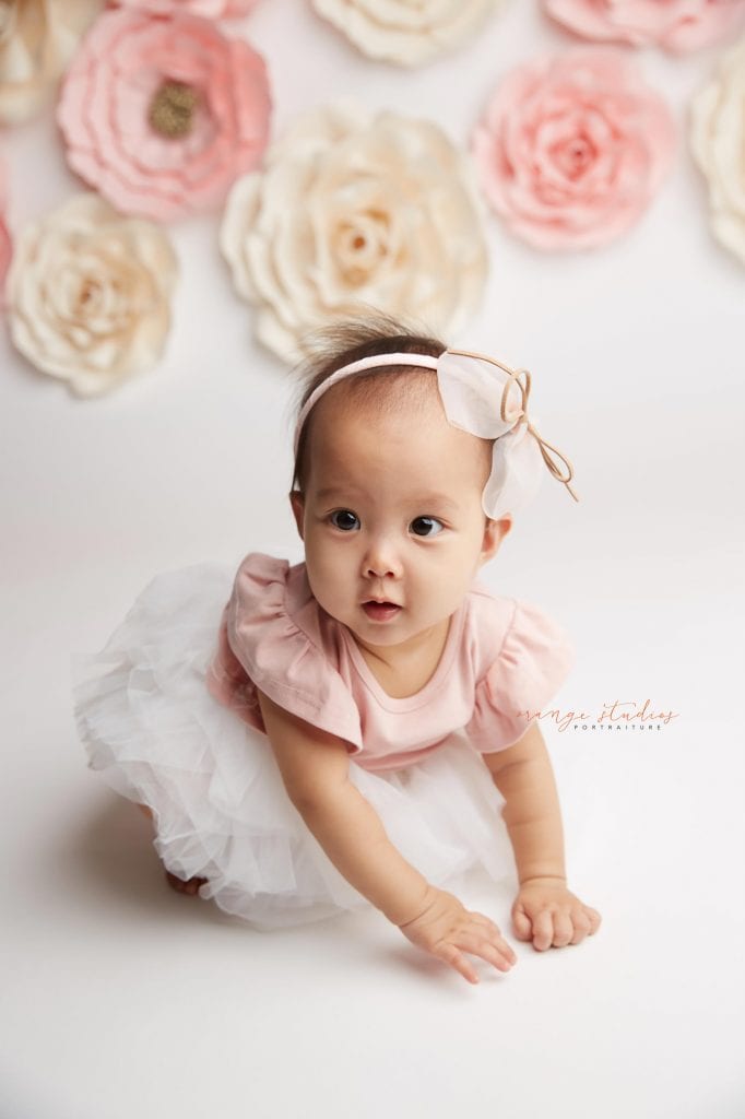 one year old baby girl flower wall portraits in singapore studio