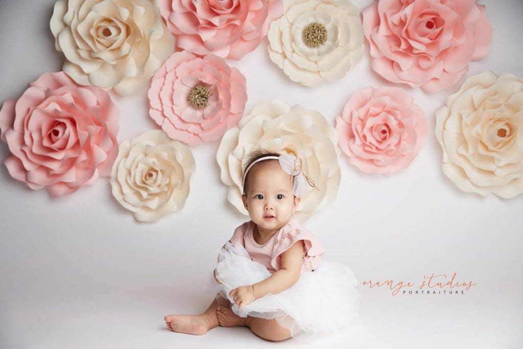 one year old baby girl flower wall portraits in singapore studio