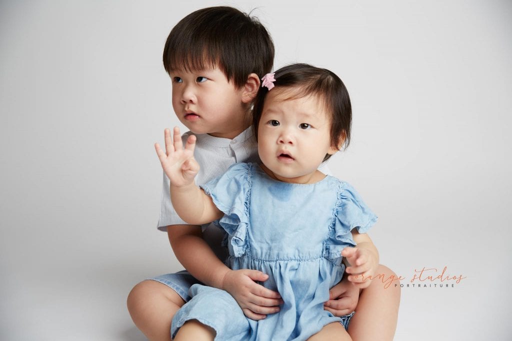 children siblings portraits in singapore studio
