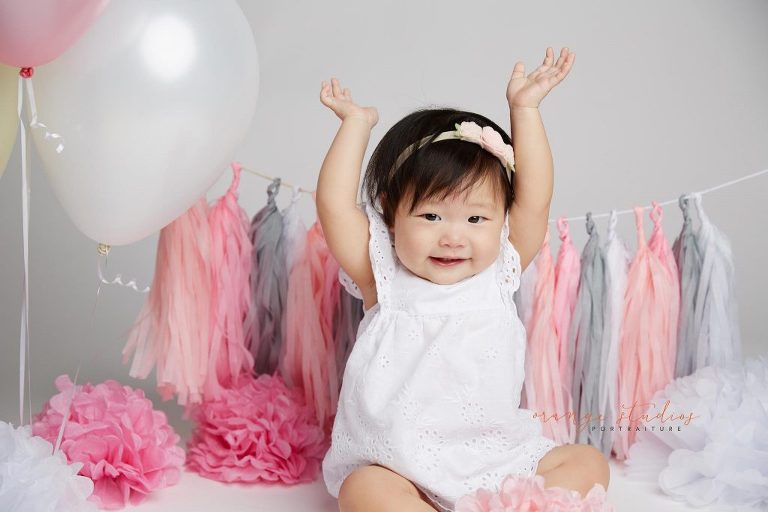 one year old baby girl cake smash portraits in singapore studio