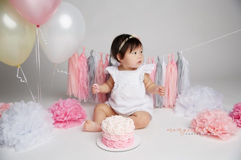 one year old baby girl cake smash portraits in singapore studio