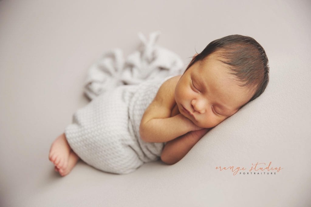 10 days old baby boy natural and clean newborn portraits in singapore studio