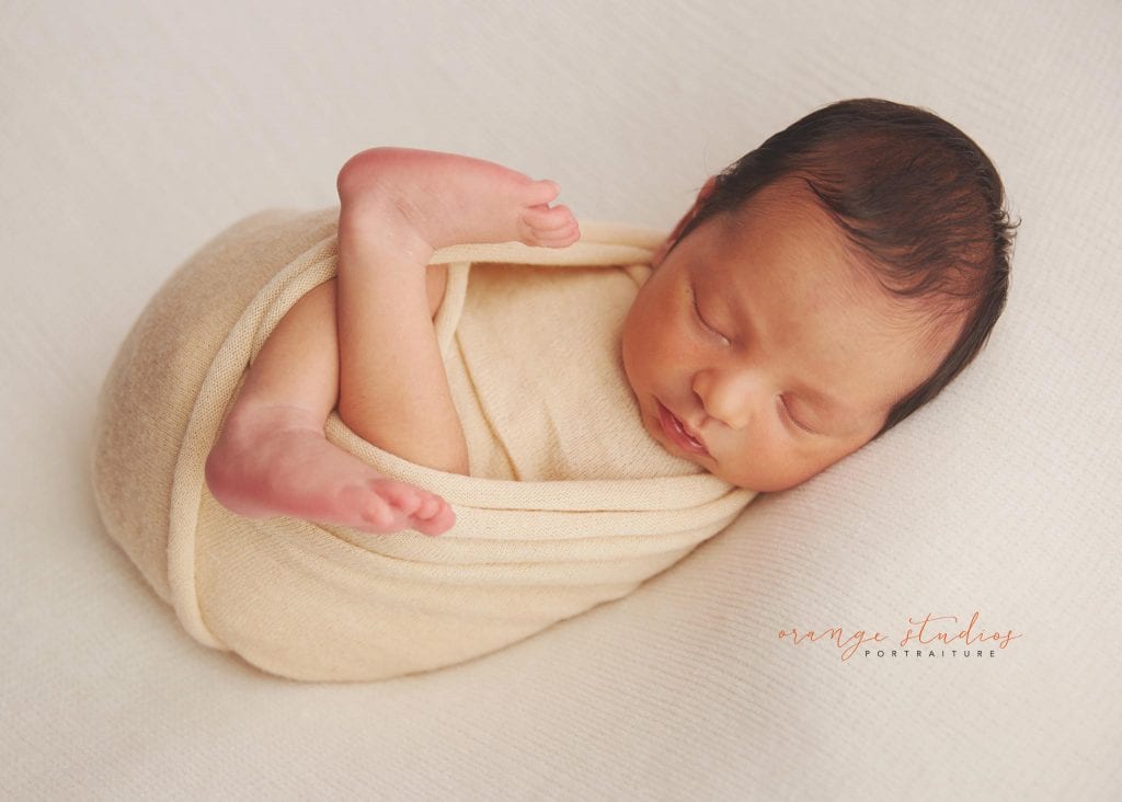 10 days old baby boy natural and clean newborn portraits in singapore studio