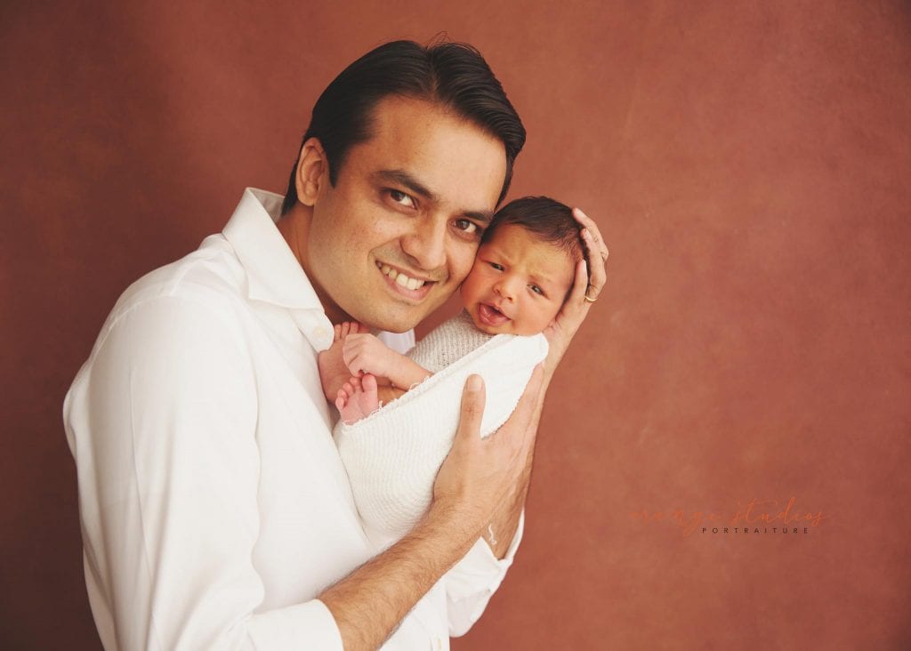 10 days old baby boy newborn portraits with dad in singapore studio
