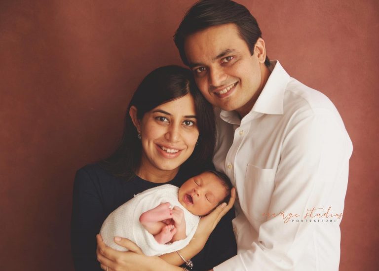 10 days old baby boy newborn portraits with parents in singapore studio