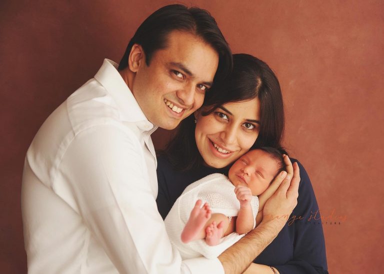 10 days old baby boy newborn portraits with parents in singapore studio