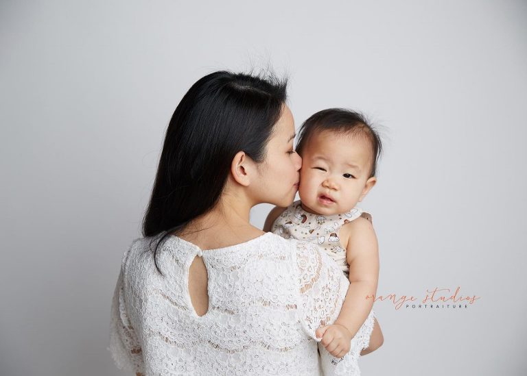 mum and baby family portraits in singapore studio