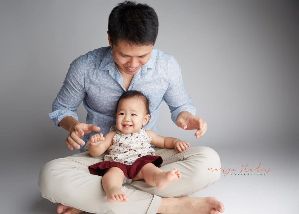 dad and baby family portraits in singapore studio