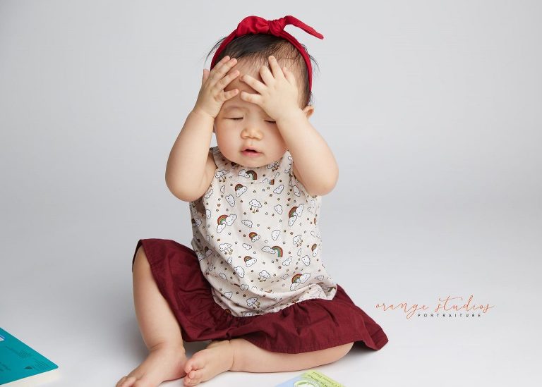 one year old cute baby girl portraits in singapore studio