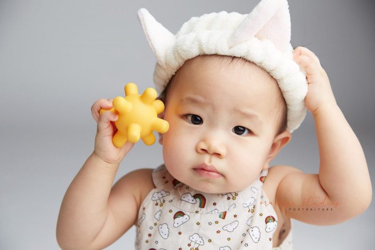 one year old baby girl portraits in singapore studio