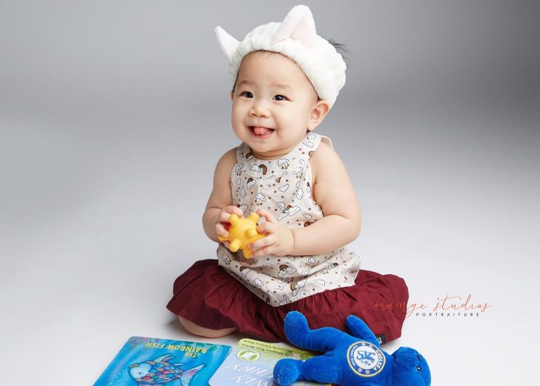 one year old cute baby girl portraits in singapore studio