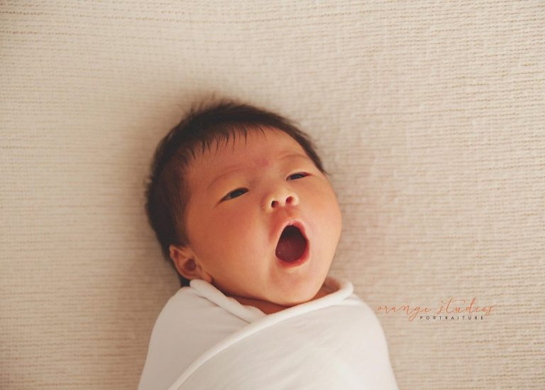 9 days old baby girl natural and clean newborn portraits in singapore studio