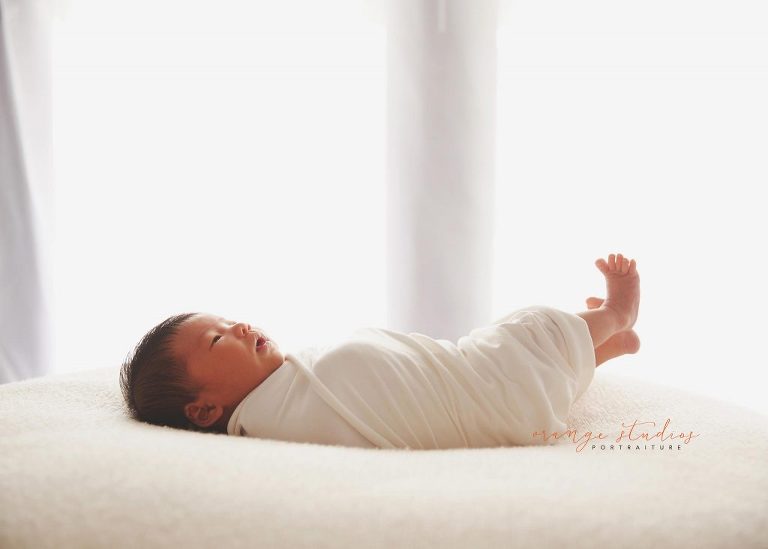 9 days old baby girl natural and clean newborn portraits in singapore studio