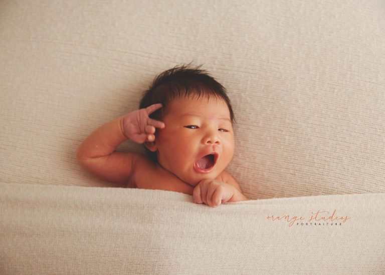 9 days old baby girl natural and clean newborn portraits in singapore studio