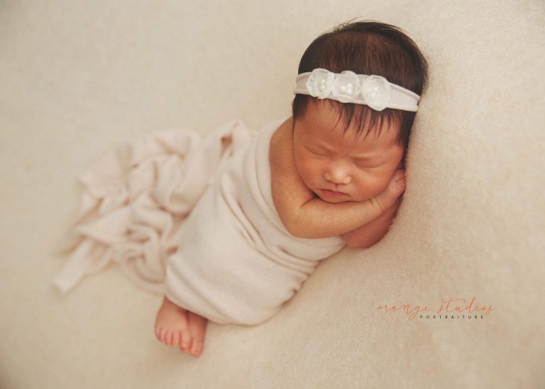 9 days old baby girl newborn portraits in singapore studio