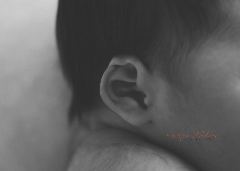 9 days old baby girl natural and clean black and white newborn portraits in singapore studio