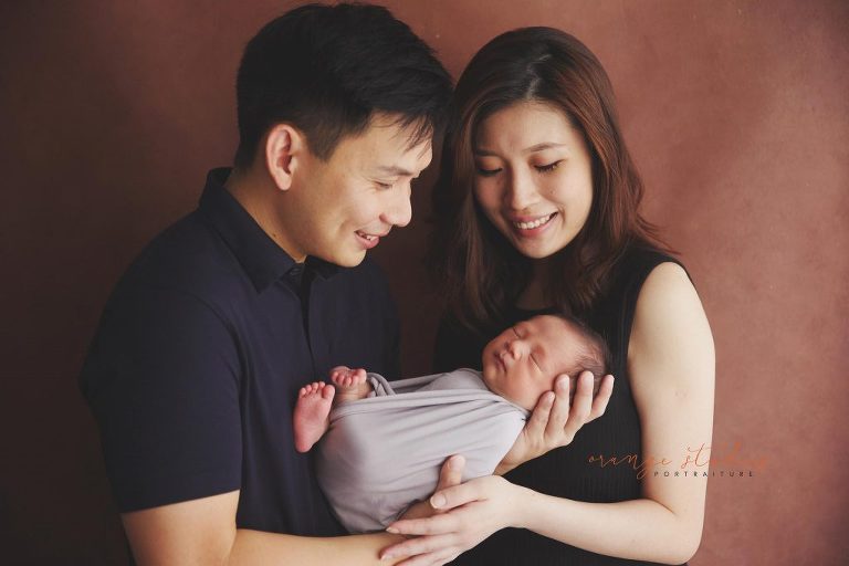 7 days old baby boy newborn portraits with parents in singapore home