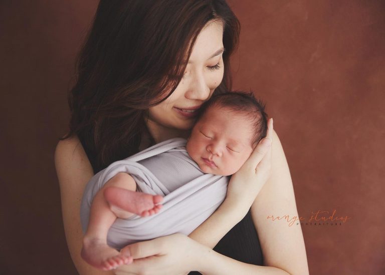 7 days old baby boy newborn portraits with mum in singapore home