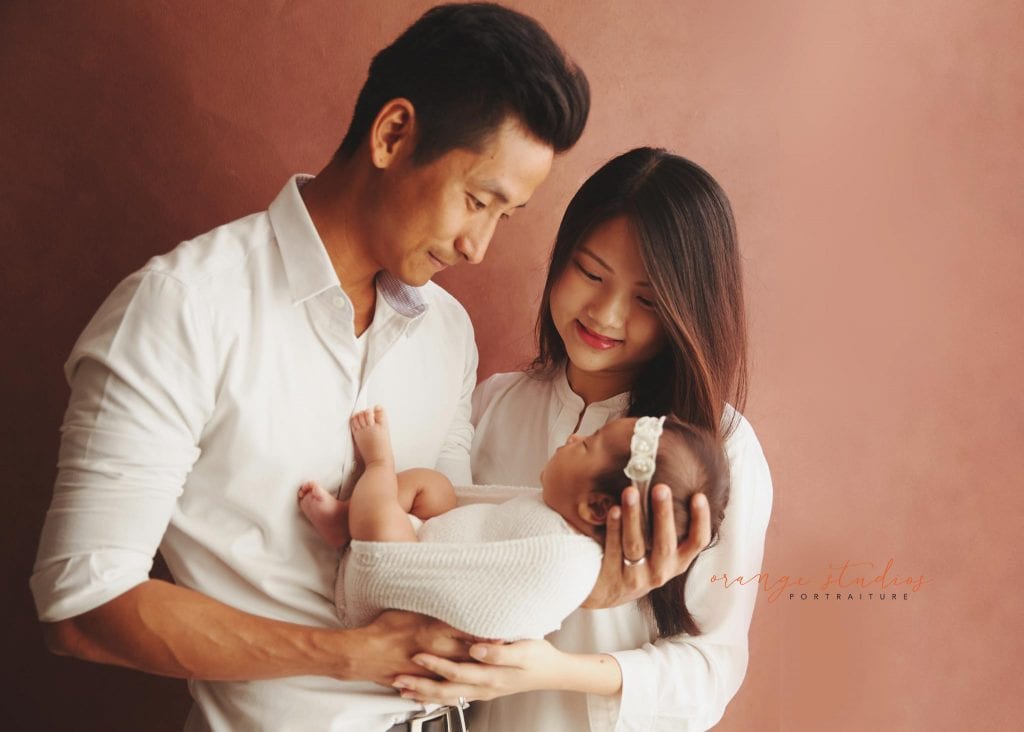 6 weeks old baby girl newborn portraits with parents in singapore studio