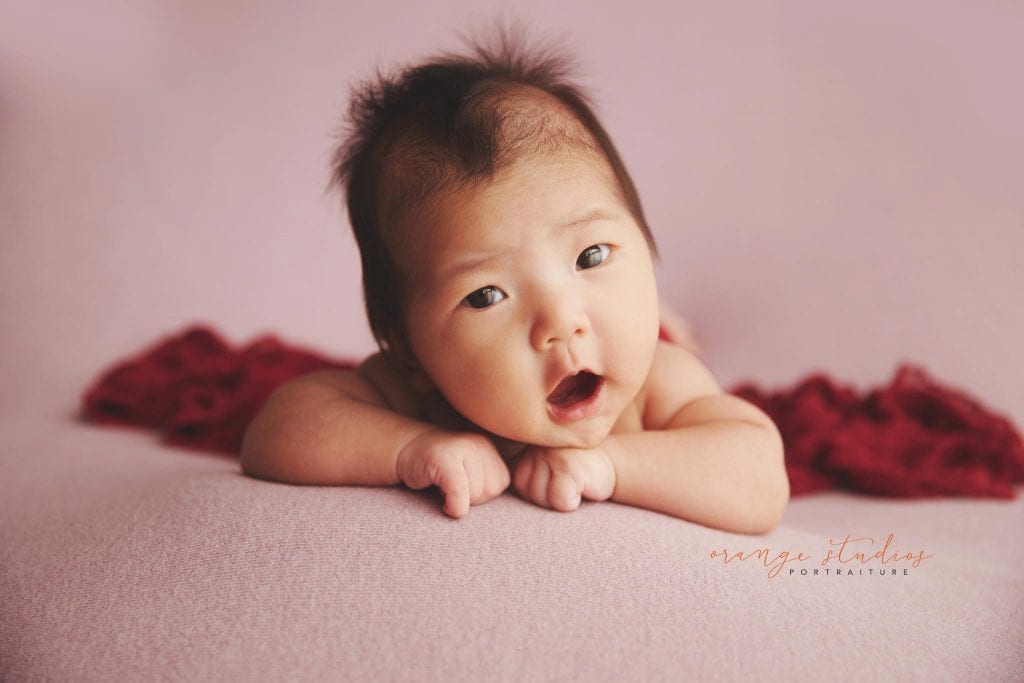 6 weeks old baby girl awake newborn portraits in singapore studio