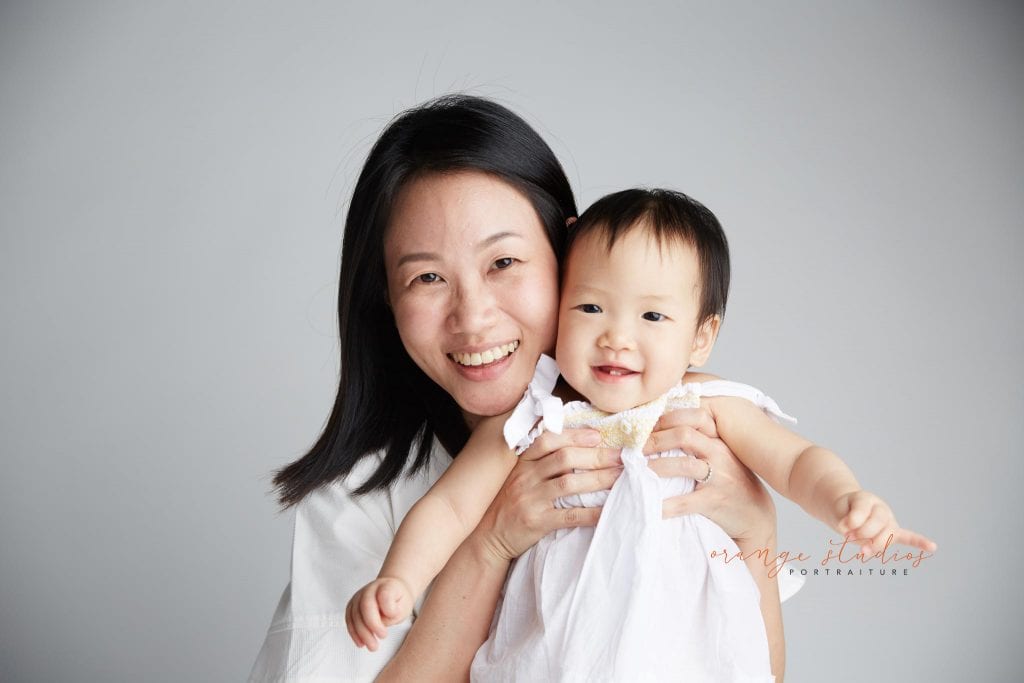 mum and baby family portraits in singapore studio