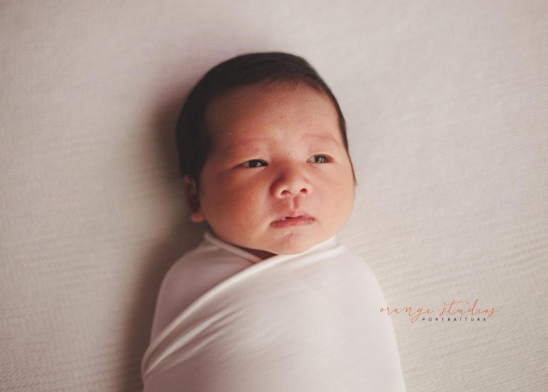 13 days old awake baby boy newborn portraits in singapore studio