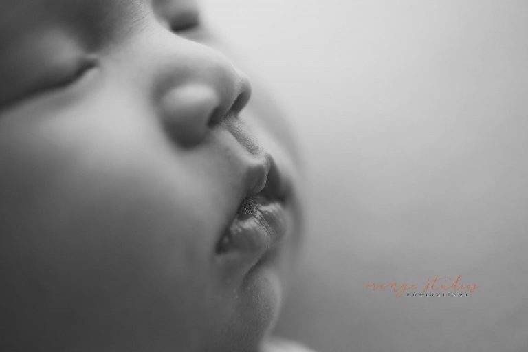 4 weeks old baby girl black and white newborn portraits in singapore studio