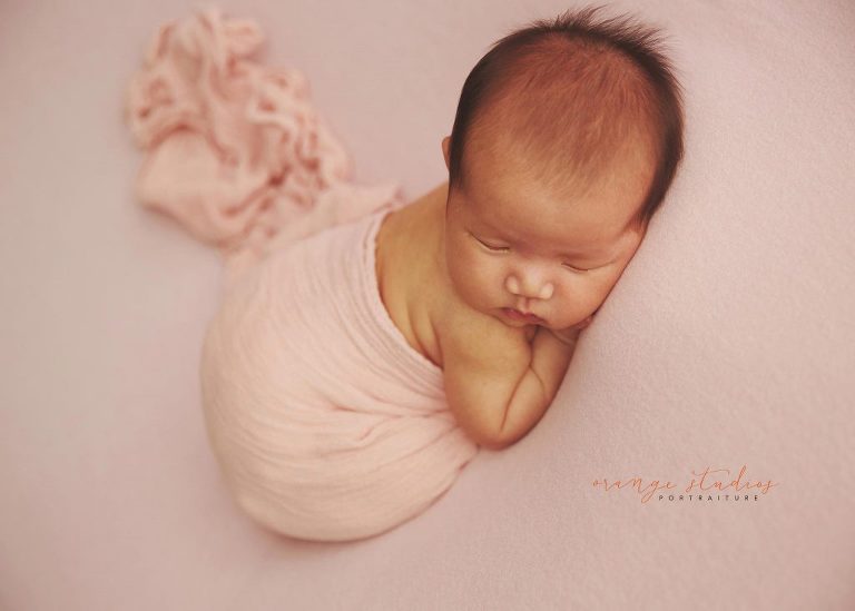 4 weeks old baby girl newborn portraits in singapore studio