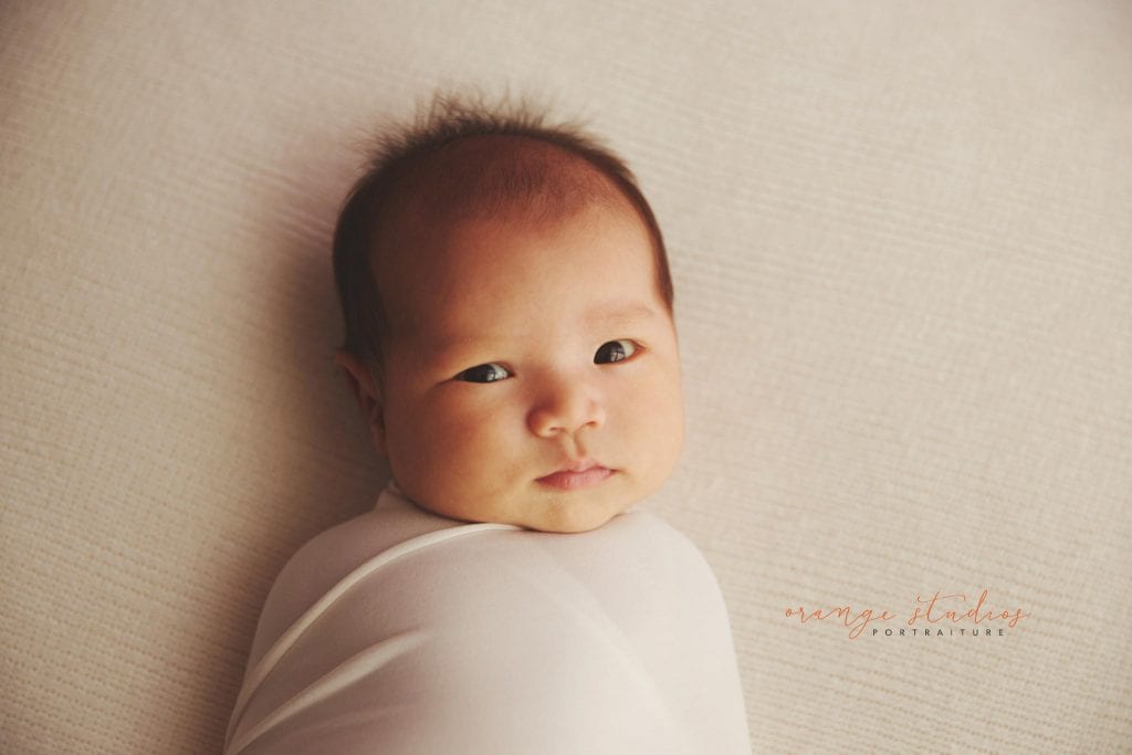 4 weeks old baby girl newborn portraits in singapore studio