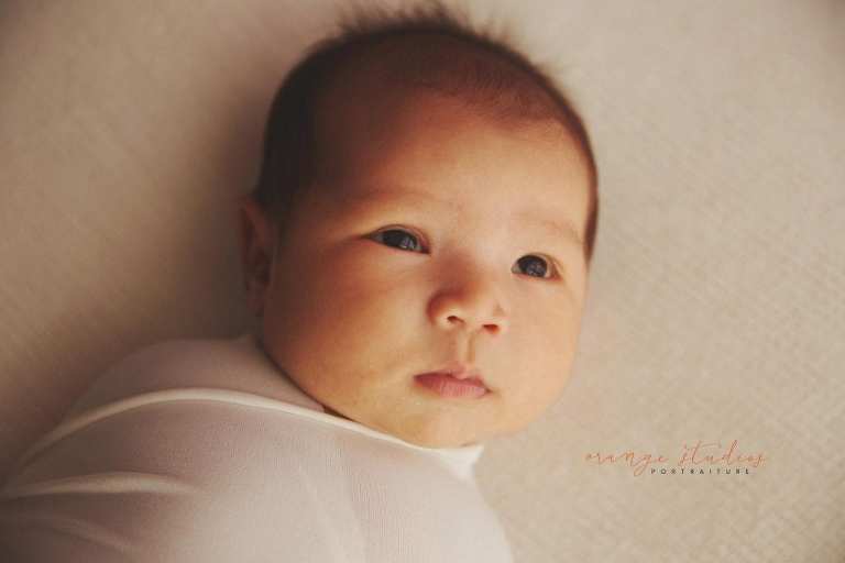 4 weeks old baby girl newborn portraits in singapore studio