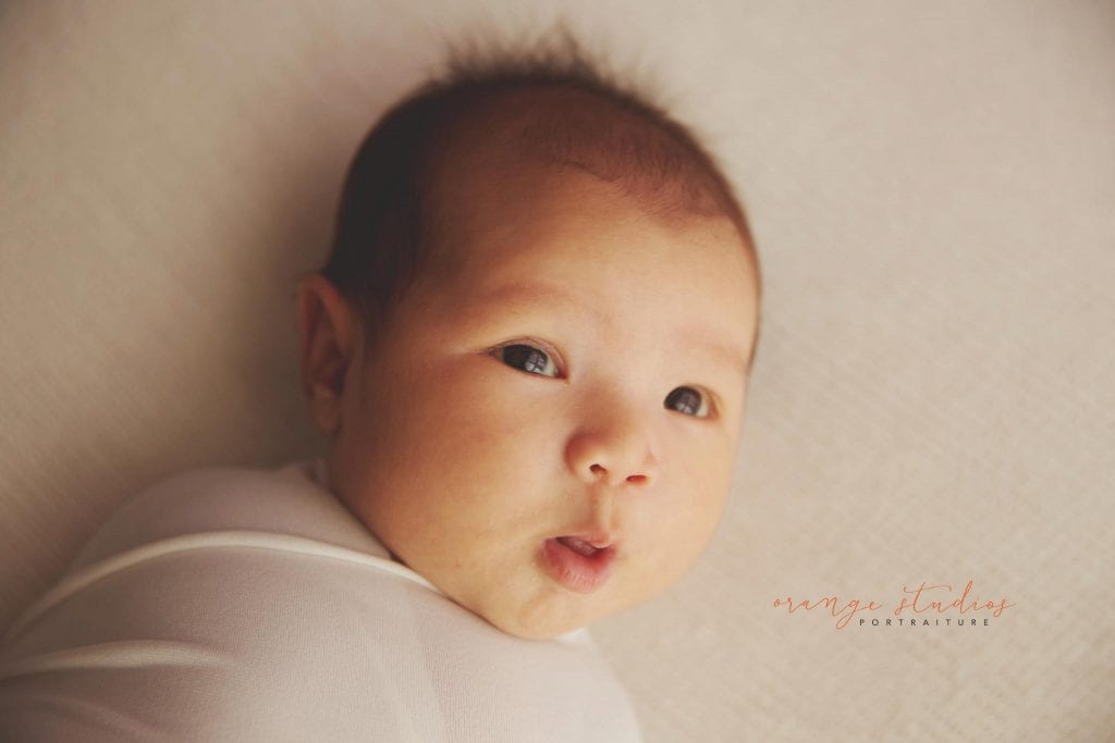 4 weeks old baby girl newborn portraits in singapore studio
