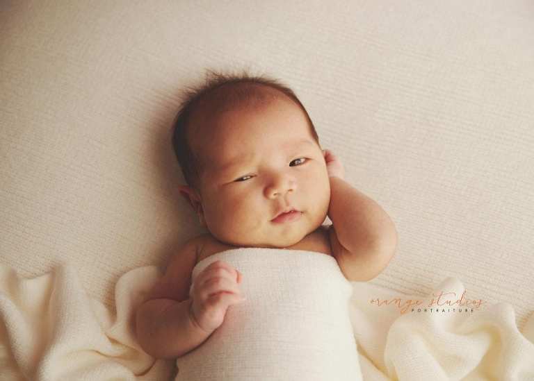 4 weeks old baby girl newborn portraits in singapore studio