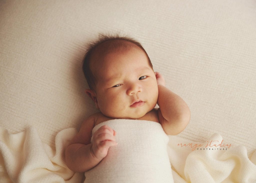 4 weeks old baby girl newborn portraits in singapore studio