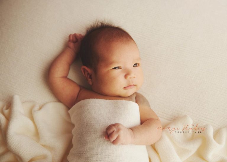 4 weeks old baby girl newborn portraits in singapore studio