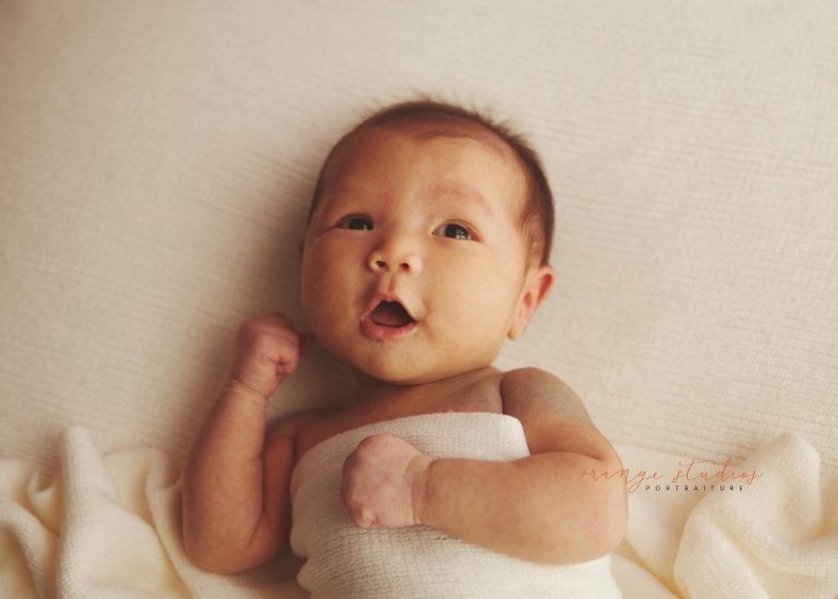 adorable 4 weeks old baby girl newborn portraits in singapore studio